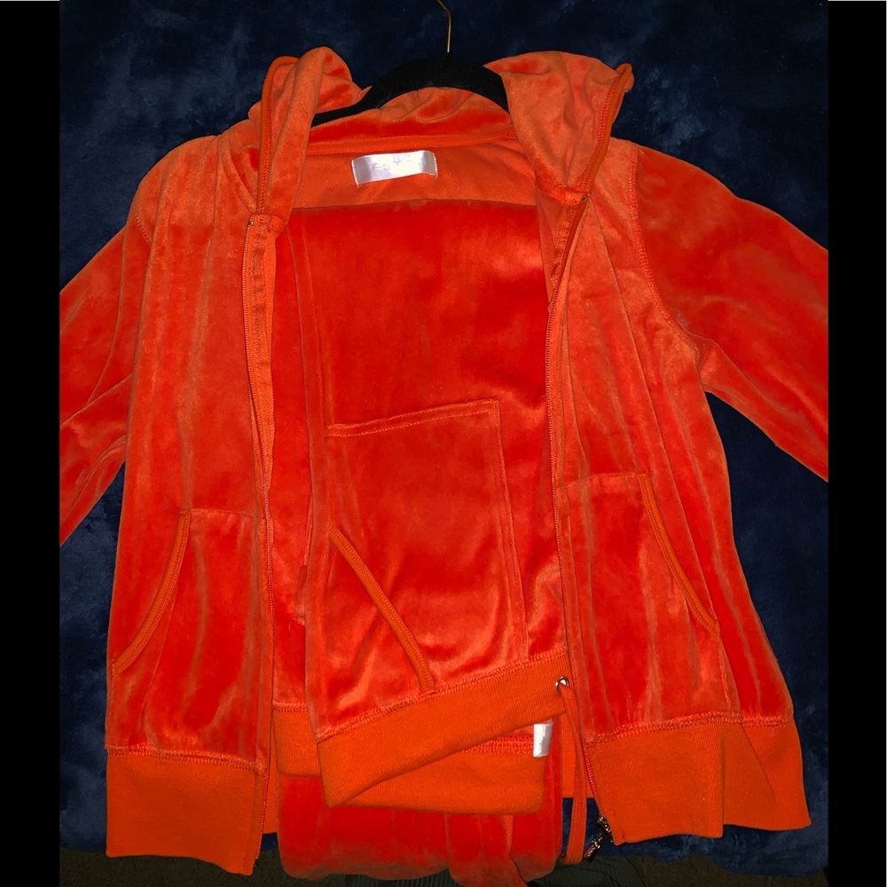 Orange two piece sweats and sweater